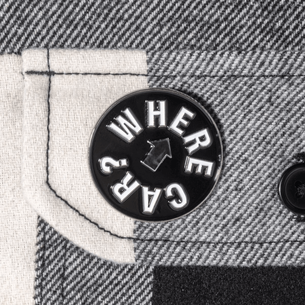Gif of a spinning enamel pin that says "Where Car?"
