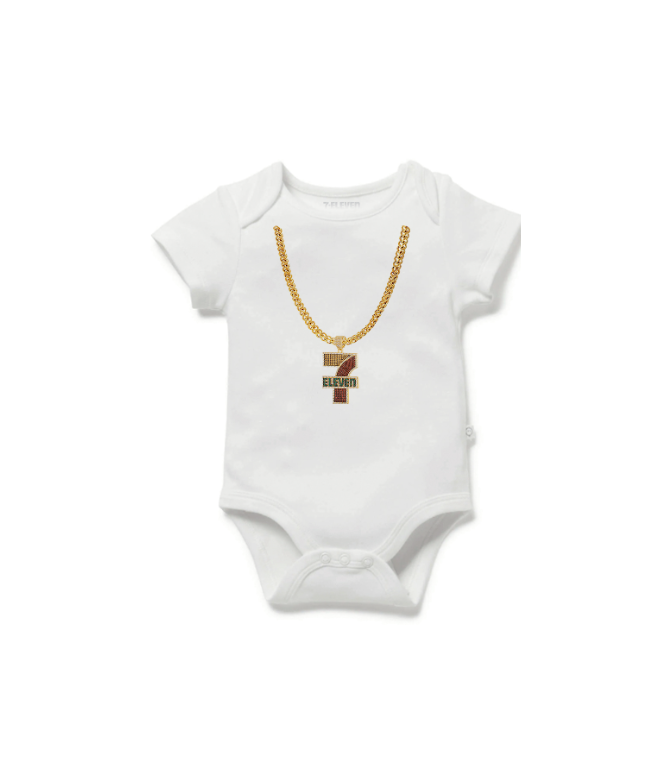 7-Eleven baby onesie with a graphic of a gold necklace and logo